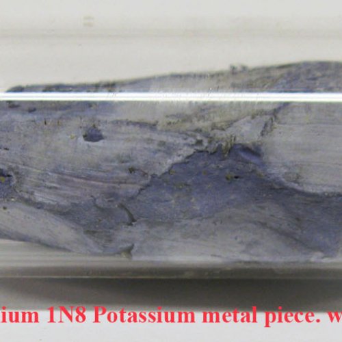 Draslík - K - Kálium 1N8 Potassium metal piece..jpg