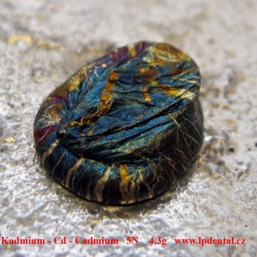 Kadmium - Cd - Cadmium  Melted Pellet. Colored. Sample with oxid sufrace.