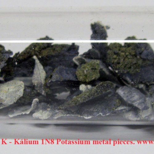 Draslík - K - Kálium 1N8 Potassium metal pieces..jpg