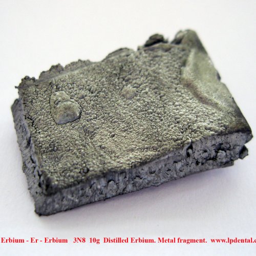 Erbium - Er - Erbium   3N8  10g  Distilled Erbium. Metal fragment..jpg
