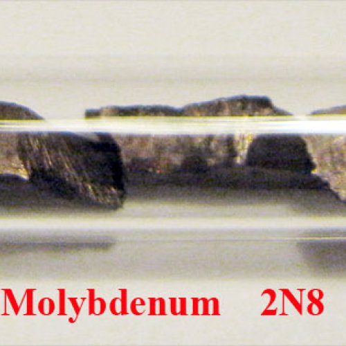 Molybden - Mo - Molybdenum machined pieces with oxide sufrace.