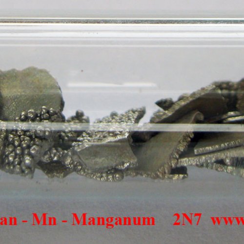 Mangan - Mn - Manganum -Electrolytic Manganese Metal Flake. with oxide-free surface.