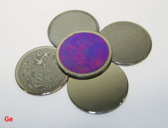 Optical grade USED Ge Metal Lens Chipped Discs.jpg