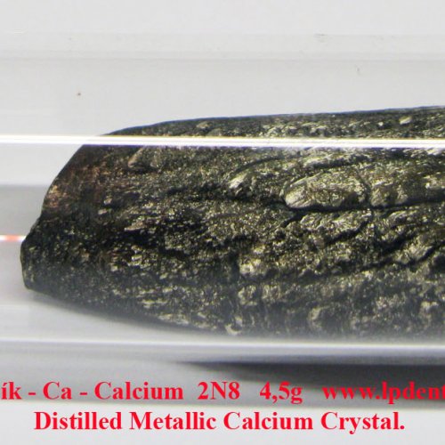 Vápník-Ca-Calcium  4,5g Distilled Metallic Calcium Crystal..jpg