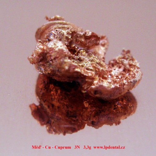 Měď - Cu - Cuprum Copper melted piece of metal.